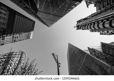 London, UK - February 15th 2019: Looking Up At The Modern Architecture In The City Of London. The Buildings Include The Gherkin, Cheesegrater, Scalpel, Willis Building And The Llloyds Building.