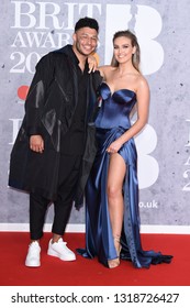 LONDON, UK. February 20, 2019: Alex Oxlade Chamberlain & Perry Edwards Arriving For The BRIT Awards 2019 At The O2 Arena, London.
Picture: Steve Vas/Featureflash
*** EDITORIAL USE ONLY ***