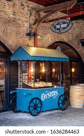 LONDON, UK - FEBRUARY 20, 2019:   Oyster Cart Outside Drops Wine Bar Restaurant In Coal Drops Yard