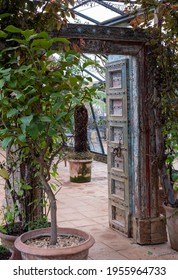 London UK. February 2020. Entrance With Chabby Chic Blue Wooden Door
To The Greenhouse Cafe At Petersham Nurseries Garden Centre, Richmond Upon Thames, London UK