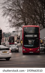 London UK February 2021 Cold Vertical Winter Shot Of A Number 40 London Bus Waiting On An Intersection, Going To Dutwitch Library During UKs National Covid Lockdown