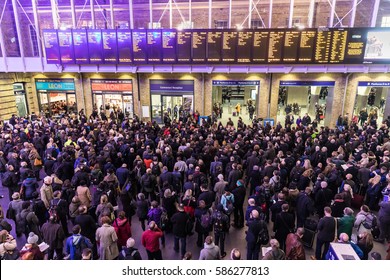 LONDON, UK - FEBRUARY 23, 2017: Crowded Kings Cross Station In The City. Hundreds People Waiting For The Train, With Delays And Cancellations As Storm Doris Lashes UK