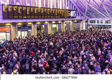 LONDON, UK - FEBRUARY 23, 2017: Crowded Kings Cross Station In The City. Hundreds People Waiting For The Train, With Delays And Cancellations As Storm Doris Lashes UK