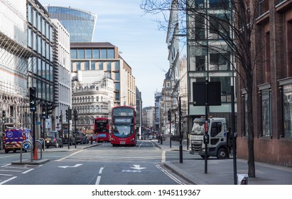 London, UK - February 23, 2021: St. Paul's Church Yard Street With Double-decker Buses And  Empty Streets City Of London During National Lockdown. Covid Restrictions, Social Distancing. 