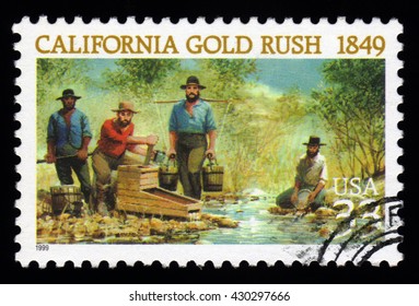 London, UK, February 5 2011 - Vintage 1999 United States Of America Cancelled Postage Stamp  Showing An Image Of California Gold Rush Miners Panning For Gold