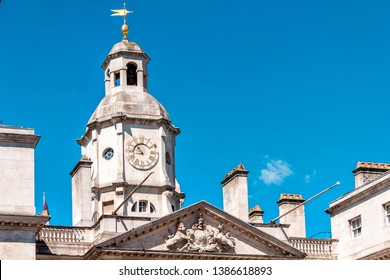 London, UK Horse Guards Parade Whitehall building in the city of Westminster architecture closeup of clock tower blue sky
