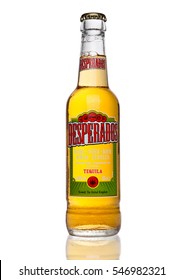 LONDON, UK - JANUARY 02, 2017: Bottle of Desperados beer on black background, lager flavored with tequila is a popular beer produced by Heineken and sold in over 50 countries around the world.