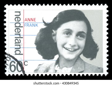 London, UK, January 15 2012 - Vintage 1980 Netherlands Cancelled Postage Stamp  Showing A Portrait Image Of  Anne Frank A Victim Of The Holocaust, Later To Become Famous For Her Diary