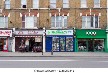 London, UK - January 2018. Local Shops, Pharmacy And Restaurants Take Away In Camden High Street, North London, UK