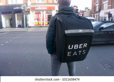 LONDON, UK - January 26th 2018: Uber Eats Delivery Perosn Wearing An Uber Eats Delivery Backpack