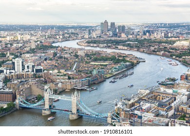 LONDON, UK - July 03, 2013. London Tower Bridge and Canary Wharf (Docklands). Aerial view of the River Thames, Central London