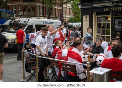 London, UK - July 11 2021: Football Fans In A Pub Chanting Before The Euro 2020 Final England V Italy.