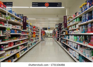 London, UK - July 13, 2019: Everyday retail products are seen on shelves in aisle at a Sainsbury's supermarket store. Sainsbury's is the UK's second largest supermarket retailer after Tesco.