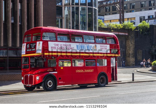 LONDON, UK - JULY 14, 2018: Red Double Decker Bus\
on the street in London. Red Double Decker Bus is one of the most\
iconic symbols of\
London.