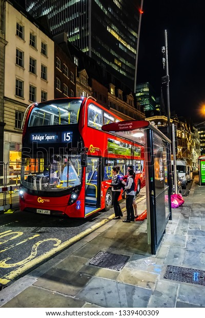 LONDON, UK - JULY 14, 2018: Red Double
Decker Bus 15 line at the bus stop at night in London. Red Double
Decker Bus is one of the most iconic symbols of
London.