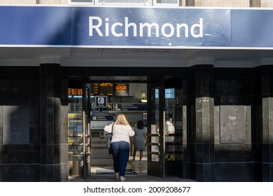 London, UK - July 16 2021: Woman Walking Into Richmond Station