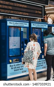 London, UK - July 18, 2019: People Buying Tickets From Self-service Machines Inside Marylebone Train Station. The Station Was Opened In 1899 For Great Central Main Line.