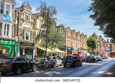 London / UK - July 18 2020: Wanstead Village High Street Shops And Restaurants, A UK High Street In East London