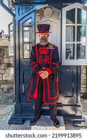 London, UK - July 19, 2022 : The Tower Of London Famous Beefeater Royal Guard In London