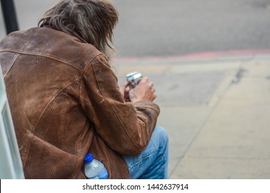 London, UK, July 2, 2019: Old Homeless Man At The Corner Of The Street