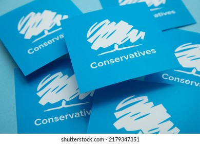 LONDON, UK - July 2022: Conservative United Kingdom Political Party Logo Against A Blue Background