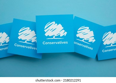 LONDON, UK - July 2022: Conservative United Kingdom Political Party Logo Against A Blue Background