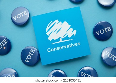 LONDON, UK - July 2022: Conservative United Kingdom Political Party Logo With Blue Vote Badges