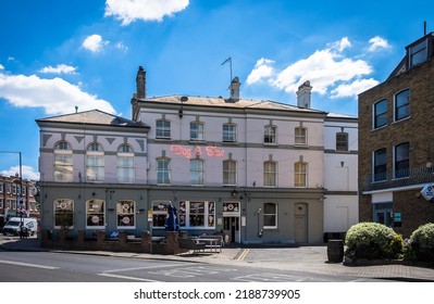 London, UK, July 2022, View Of The Dog And Fox, A Pub And Hotel In Wimbledon Village High Street