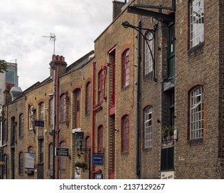 LONDON, UK - JULY 29, 2017:  View of old Warehouse Fixtures along Historic Street of Shad Thames in Bermondsey