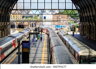 London, UK - July 5, 2016 - Trains Stop At The Platforms In Kings Cross Train Station