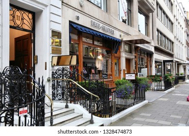 LONDON, UK - JULY 6, 2016: Tailor Shops At Savile Row In London. Savile Row Is A Street In Mayfair, Traditionally Known For Tailors.