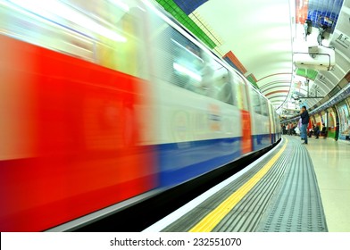 LONDON, UK - JULY 9, 2014: High Speed Train Enters Piccadilly Underground Station In London.