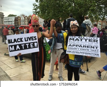 London / UK - July 9th 2016: Black Lives Matter UK marches through the streets of Brixton in solidarity with Ferguson following the killing of Mike Brown and against racism within UK