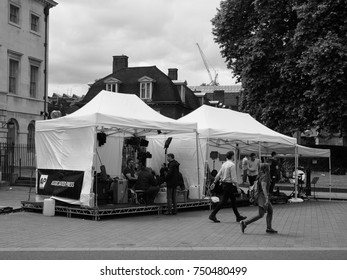 LONDON, UK - JUNE 09, 2017: Press and TV crews in College Green Westminster just opposite the Houses of Parliament, on the day following the June 8 general elections in black and white - Shutterstock ID 750480499
