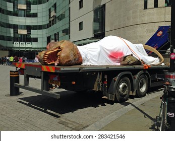 LONDON, UK - JUNE 1, 2015:  National Geographic Channel Publicity For Its T-Rex Autopsy Programme.  Life Size Tyrannosaurus Dinosaur Outside BBC Broadcasting House In Portland Place, London.