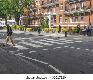 LONDON, UK - JUNE 10, 2015: Abbey Road Zebra Crossing Made Famous By The 1969 Beatles Album Cover