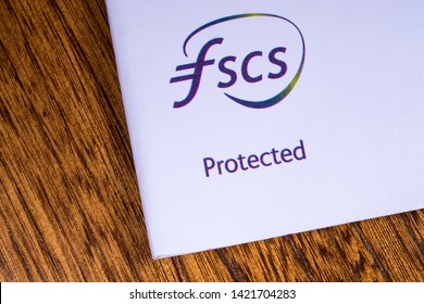 London, UK - June 11th 2019: A Close-up Of The FSCS - Financial Services Compensation Scheme Logo, Pictured On An Information Leaflet.