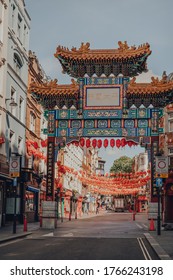 London, UK - June 13, 2020: Ornamental Gate With Qing Dynasty Designs On Empty Street In Chinatown, A Typically Busy Area Of London Famous For Its Restaurants And Home To A Large East Asian Community.