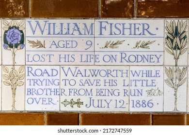 London, UK - June 14th 2022: Plaque At The Memorial To Heroic Self-Sacrifice In Postmans Park In London, UK - Commemorating Ordinary People Who Died While Saving The Lives Of Others.