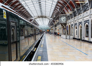 London, UK - June 19, 2016: London Paddington station with unidentified people. Much of the main-line station dates from 1854 and was designed by Isambard Kingdom Brunel
