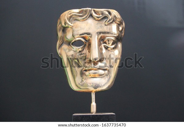London, UK - June 19th 2018 : Bafta\
(British Academy film and television awards) award statue trophy on\
display stock, photo, photograph, picture, image\
press