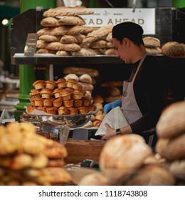 London, UK - June, 2018. Organic bread and pastries on display at a bakery stall in Borough Market, one of the biggest food market in London.
