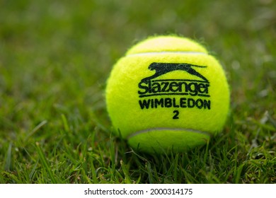 LONDON, UK - June 2021: Official Wimbledon Tennis Slazenger Brand Ball On Grass