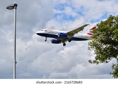 London, UK - June 2022: British Airways Plane Landing At Heathrow