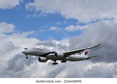 London, UK - June 2022: Malaysia Airlines Plane Landing At Heathrow