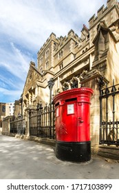 London, UK - June 21, 2018: View Of A Traditional Royal Mail Red Pillar Box Outside A Post Office.