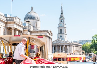 London, UK - June 22, 2018: Top of Big Bus double decker with guided tour guide and tourists sitting in seats with view of National Gallery buildings