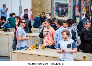 London, UK - June 22, 2018: Group Of Many People Standing Outside In England At The Shipwrights Arms Pub Tavern Bar Drinking Beer At Happy Hour