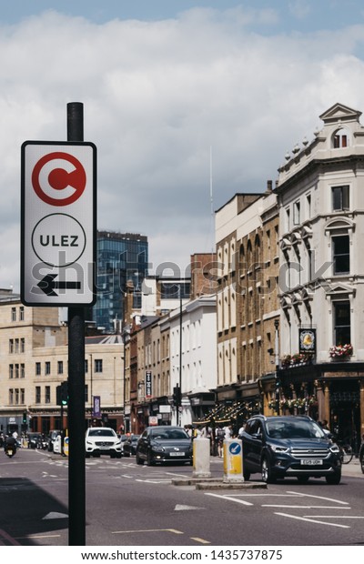 London,\
UK - June 22, 2019: Sign indicating the direction of Ultra Low\
Emission Zone (ULEZ) on a street in London. ULEZ was introduced in\
2019 to help improve air quality in the\
capital.