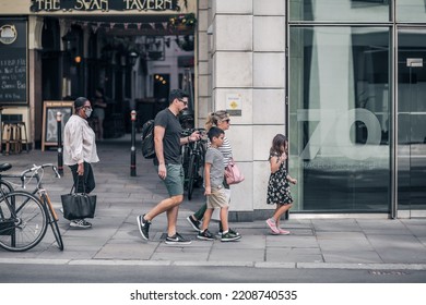 London, UK - June 22, 2022: People Walking On The City Of London Street. Busy Business Life Of The City. People Rush At Work  Street Photography